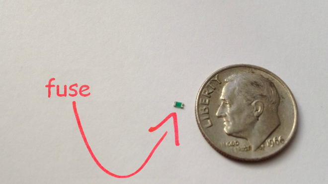 Fuse from a camera compaired to a dime